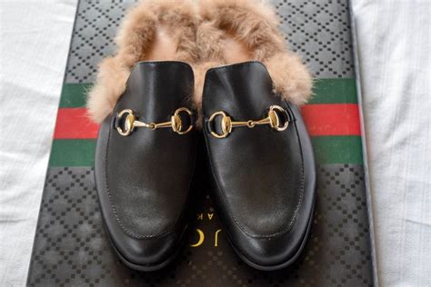 gucci fluffy slides.